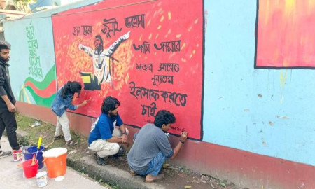 শহীদ ওসমান হাদির স্মরণে ঝালকাঠিতে দেয়ালে দেয়ালে প্রতিবাদের রং
