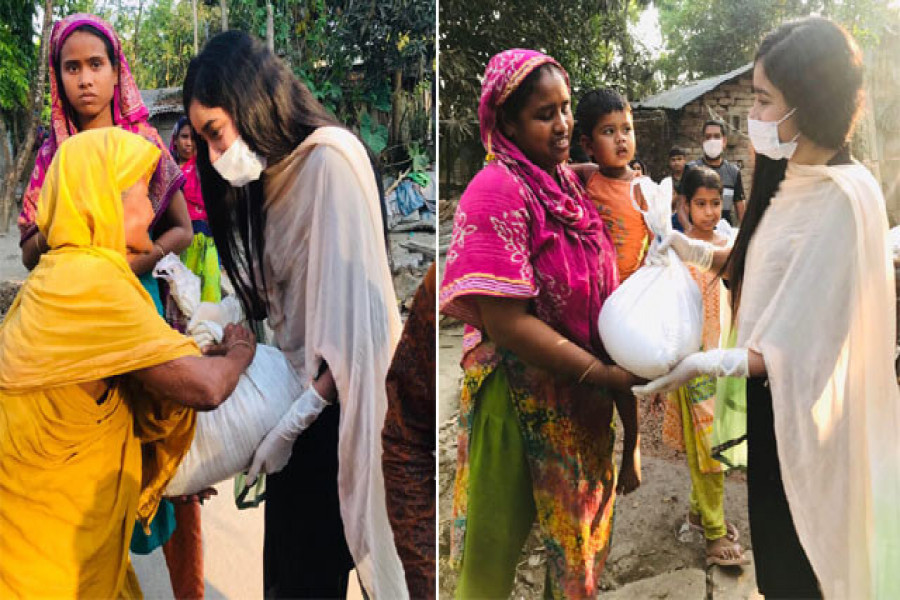 খাদ্যসামগ্রী নিয়ে অসহায় মানুষের পাশে ঢাবি ছাত্রী অনন্যা