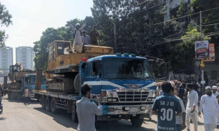 Students march from Dhaka College to Dhanmondi 32 with bulldozers on Hasina verdict day