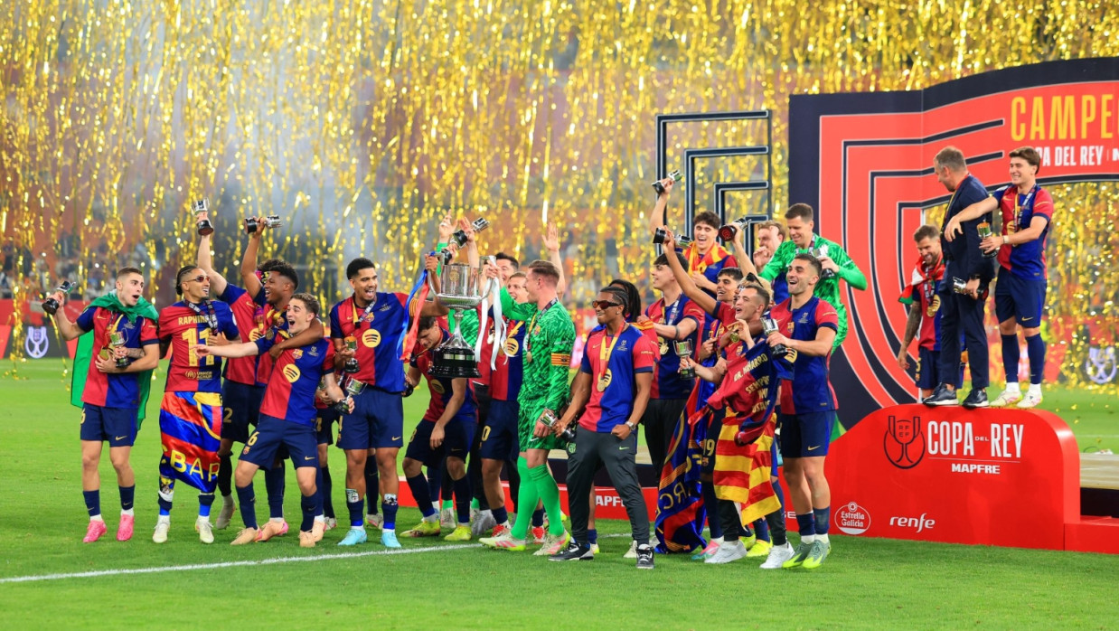 FC Barcelona Celebrating with the Supercopa Trophy 