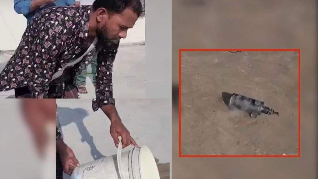 Bangladeshi Man Seen Cooling Hot Shrapnel