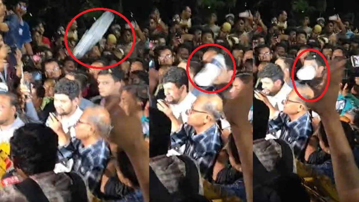 উপদেষ্টা মাহফুজের ওপর প্লাস্টিকের বোতল এসে পড়ে