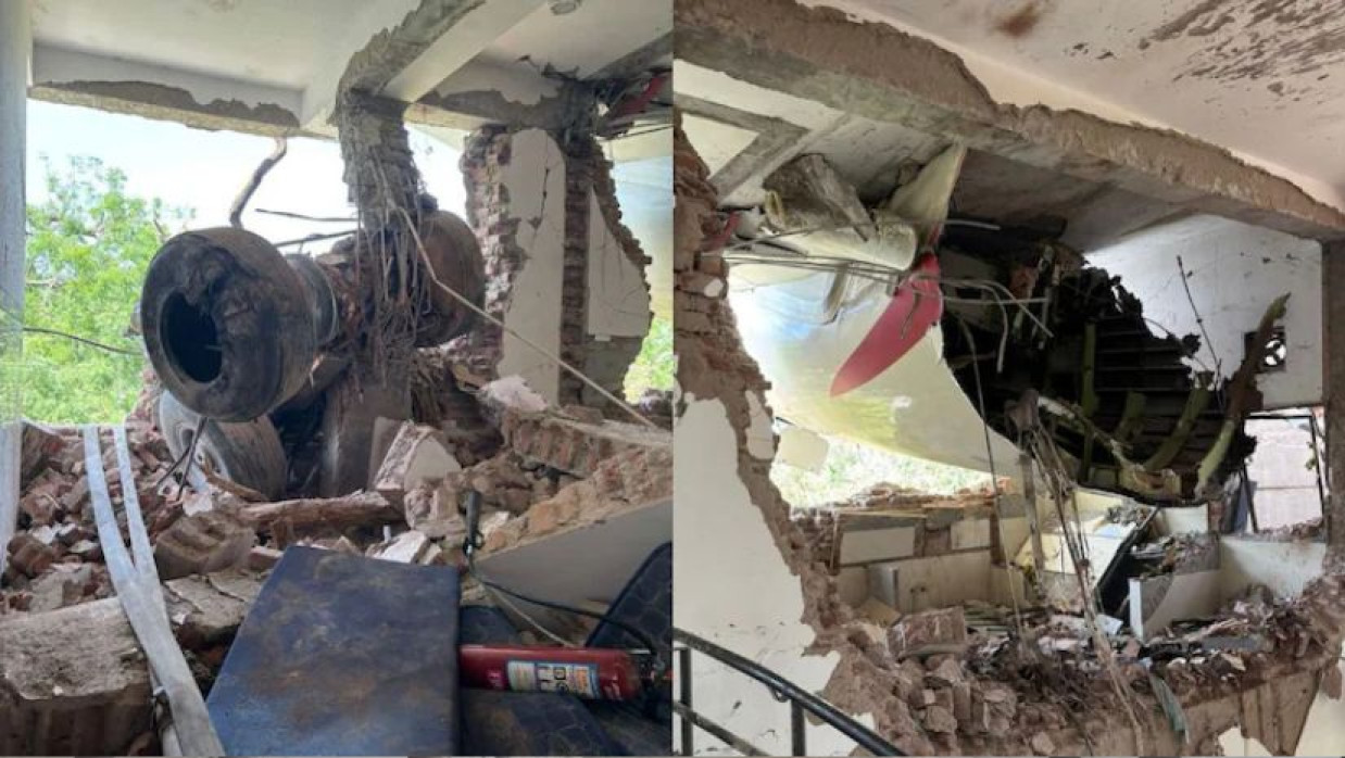 বিমান বিধ্বস্তের পর ক্ষতিগ্রস্ত হোস্টেল 