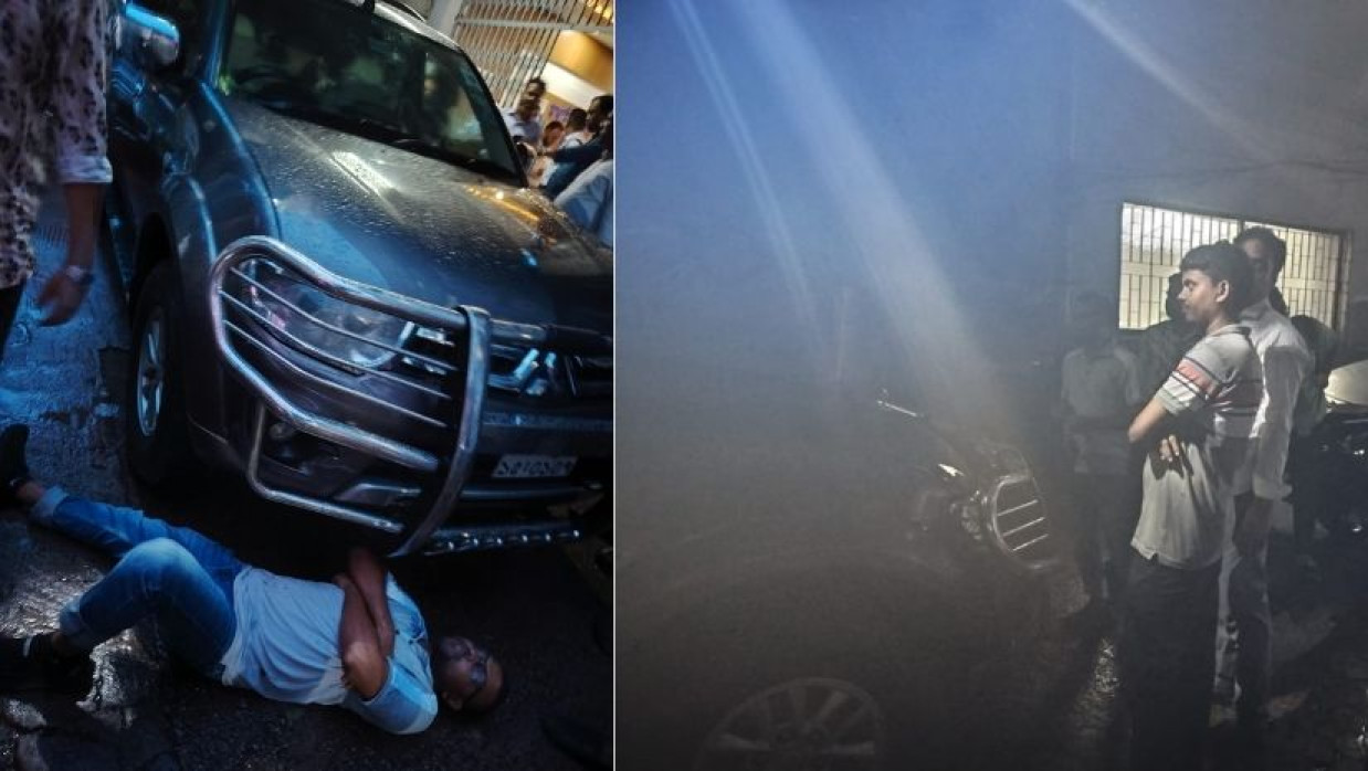 মাউশির মহাপরিচালকের গাড়ির সামনে শুয়ে পড়েন এক প্রদর্শক ফলপ্রত্যাশী ও গাড়ির সামনে অনশনকারীদের অবস্থান 