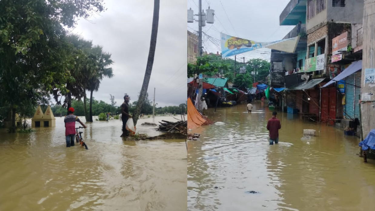 মুহুরী নদীর পানি বেড়ে বাঁধ উপচে লোকালয়ে পানি প্রবেশ শুরু করে