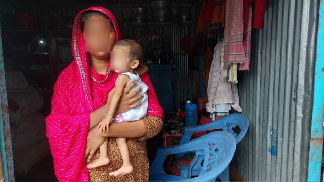 মায়ের কোলে সাত মাসের সাজ্জাদ