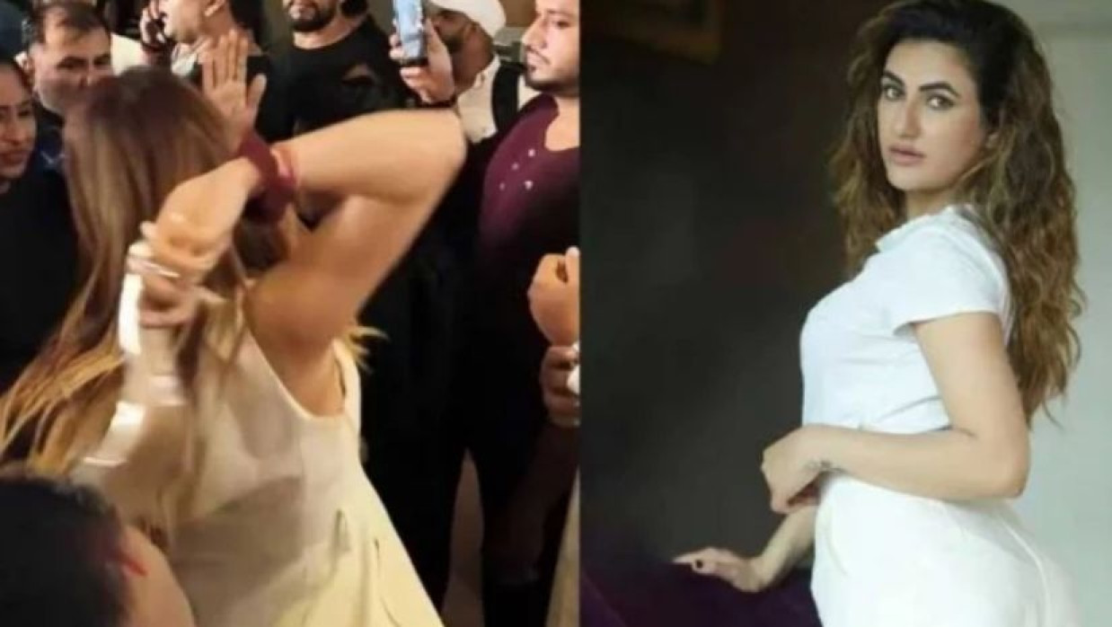 অনুষ্ঠানে রুচির জুতা নিক্ষেপ (বাঁয়ে)