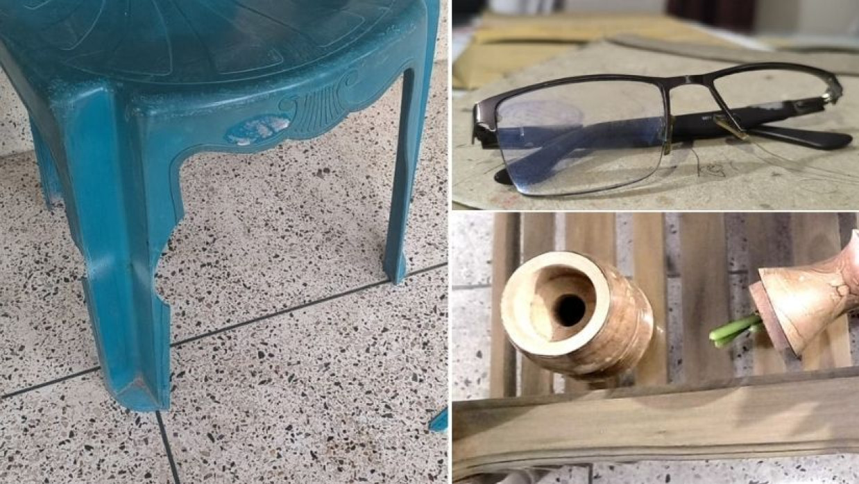 মারামারি পর পড়ে রয়েছে চেয়ার, চশমা ও ফুলদানি
