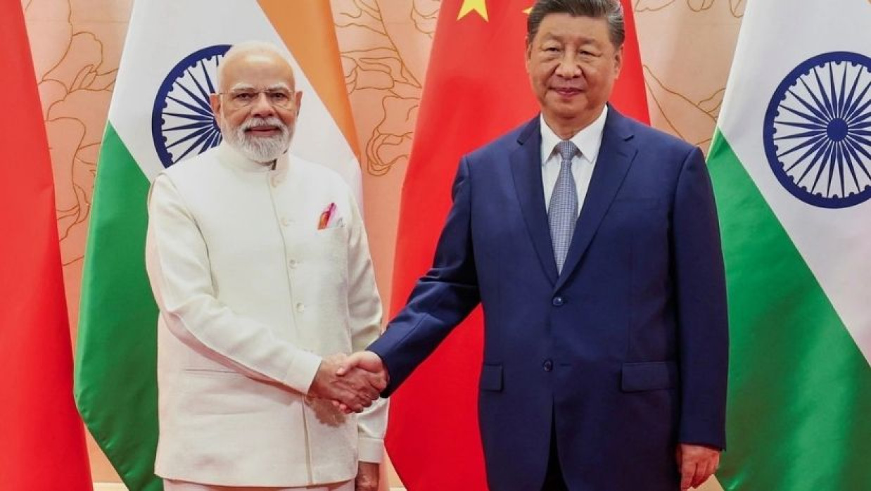 নরেন্দ্র মোদি ও  শি জিনপিং 