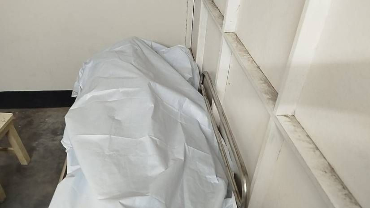 নিহত শ্রমিকের মরদেহ