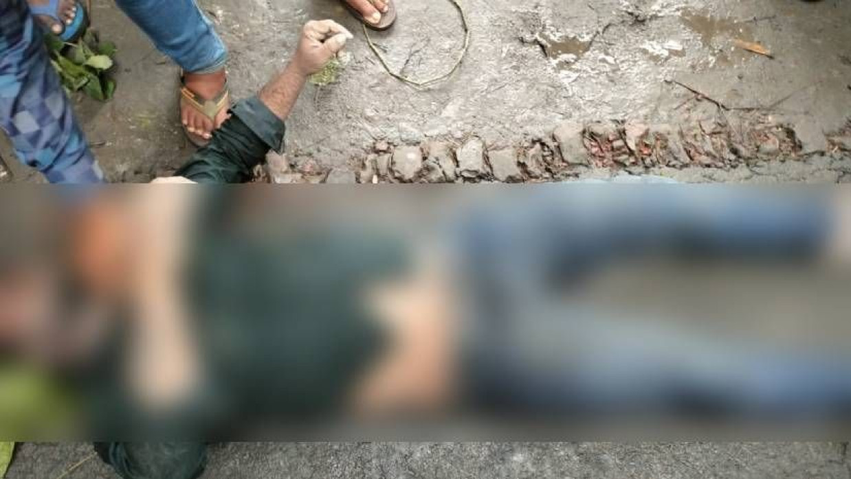 মানিক বিশ্বাসের মরদেহ