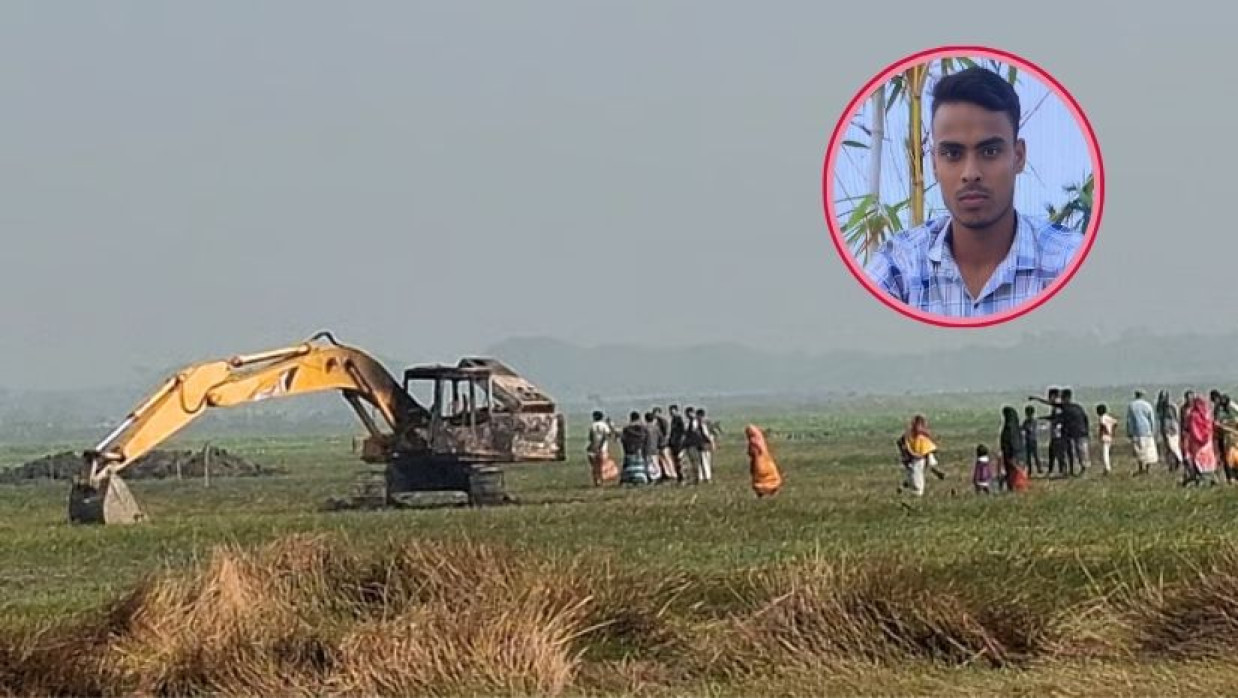 চাপা দেওয়া এক্সকেভেটর, ইনসেটে নিহত জুবায়ের হোসেন