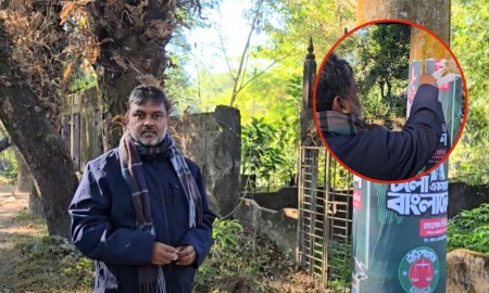আচরণবিধি মানতে নিজ হাতে নিজের পোস্টার ছিড়ছেন শিশির মনির