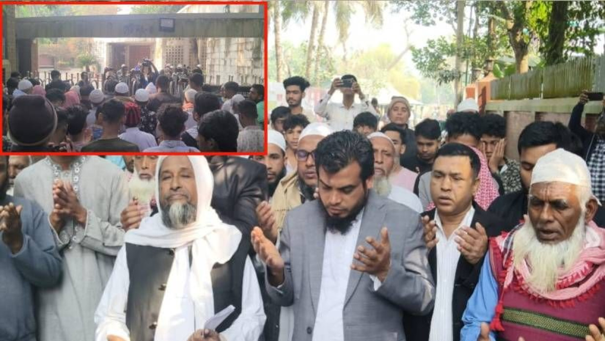 ঙ্গবন্ধুর সমাধিসৌধের ৩ নম্বর গেটে দাঁড়িয়ে শ্রদ্ধা নিবেদন ও দোয়া মোনাজাত করছেন অ্যাডভোকেট হাবিবুর রহমান হাবিব ও তার সমর্থকরা