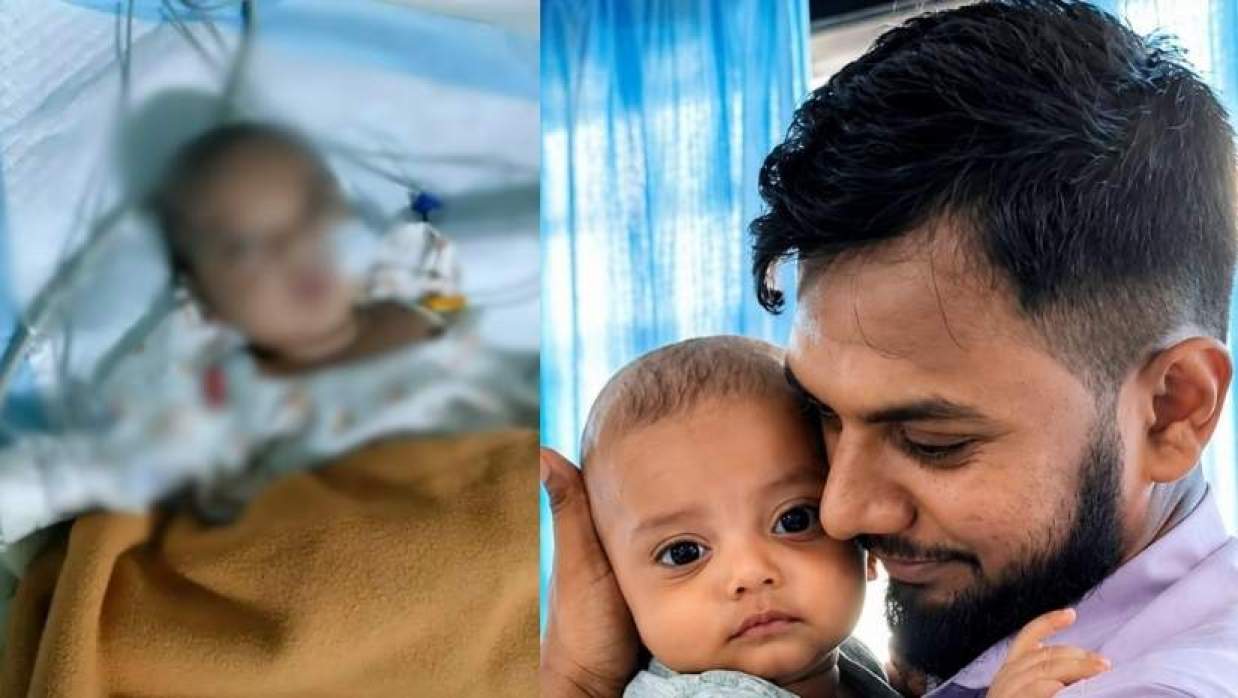 বাবা ইমরান হোসেনের কোলে অসুস্থ ছেলেটি