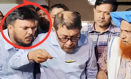 স্বাস্থ্যমন্ত্রীর চামচে ফুঁ দিয়ে ভাইরাল, জানা গেল সেই ব্যক্তির পরিচয়