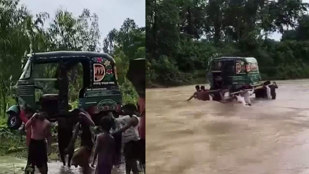 সিএনজি কাঁধে তুলে খাল পার করছেন স্থানীয়রা