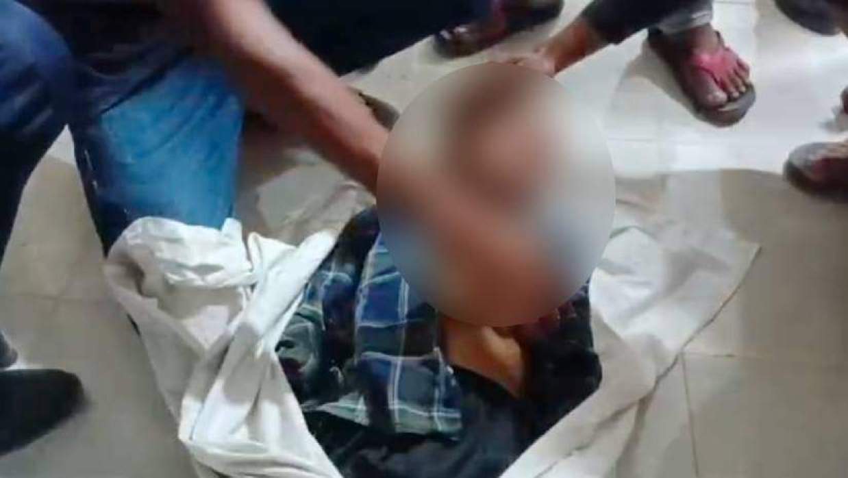 হাসাইনের মরদেহ