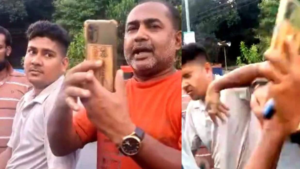 মোবাইল হাতে সাবেক ছাত্রদল নেতা