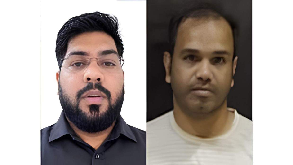 বাঁ থেকে অফিস সহায়ক নূর মোহাম্মদ ও কম্পিউটার অপারেটর জাহাঙ্গীর