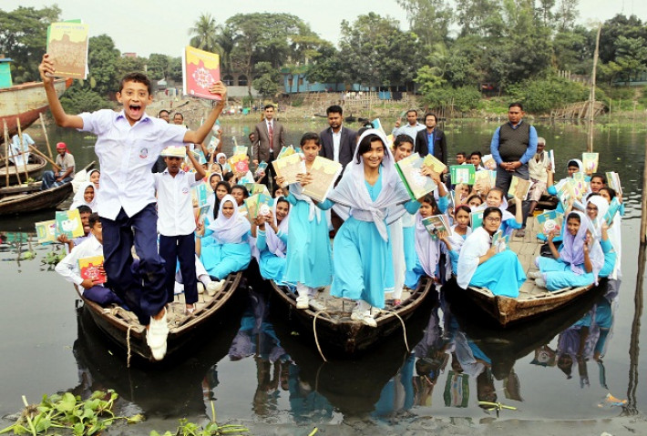 বছরের প্রথম দিন নতুন পাঠ্যপুস্তক পেয়ে শিক্ষার্থীদের উচ্ছ্বাস