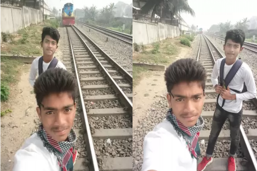 এই সেলফি তোলার পরক্ষণেই ট্রেনের ধাক্কায় মারা যায়