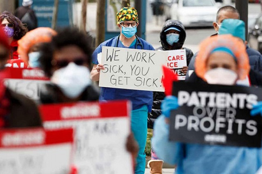 এক পিপিই বারবার পরতে বাধ্য হচ্ছেন যুক্তরাষ্ট্রের ৮৭ শতাংশ নার্স!