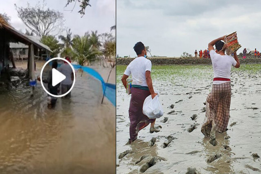 কাঁদা-পানি ভেঙে ত্রাণ পৌঁছাচ্ছেন লুঙ্গি পরিহিত রাব্বানী
