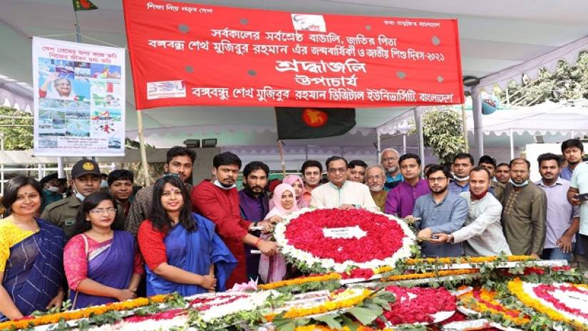 জাতির পিতার প্রতিকৃতিতে পুষ্পস্তবক অর্পণ