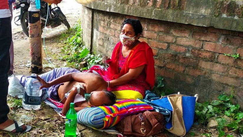 করোনায় আক্রান্ত ব্যাক্তি