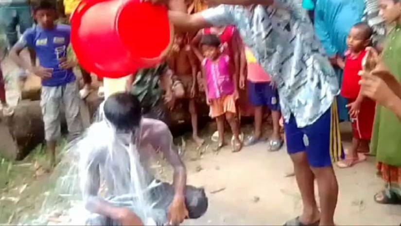 দুধ দিয়ে গোসল যুবকের