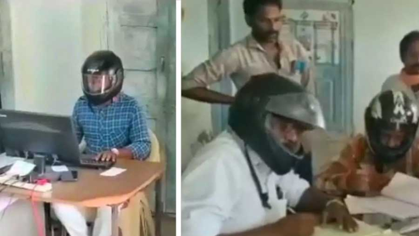 মাথায় হেলমেট পরে অফিস করেন সরকারি কর্মচারীরা!
