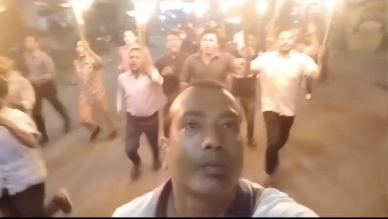 রাজধানীতে মশাল মিছিল