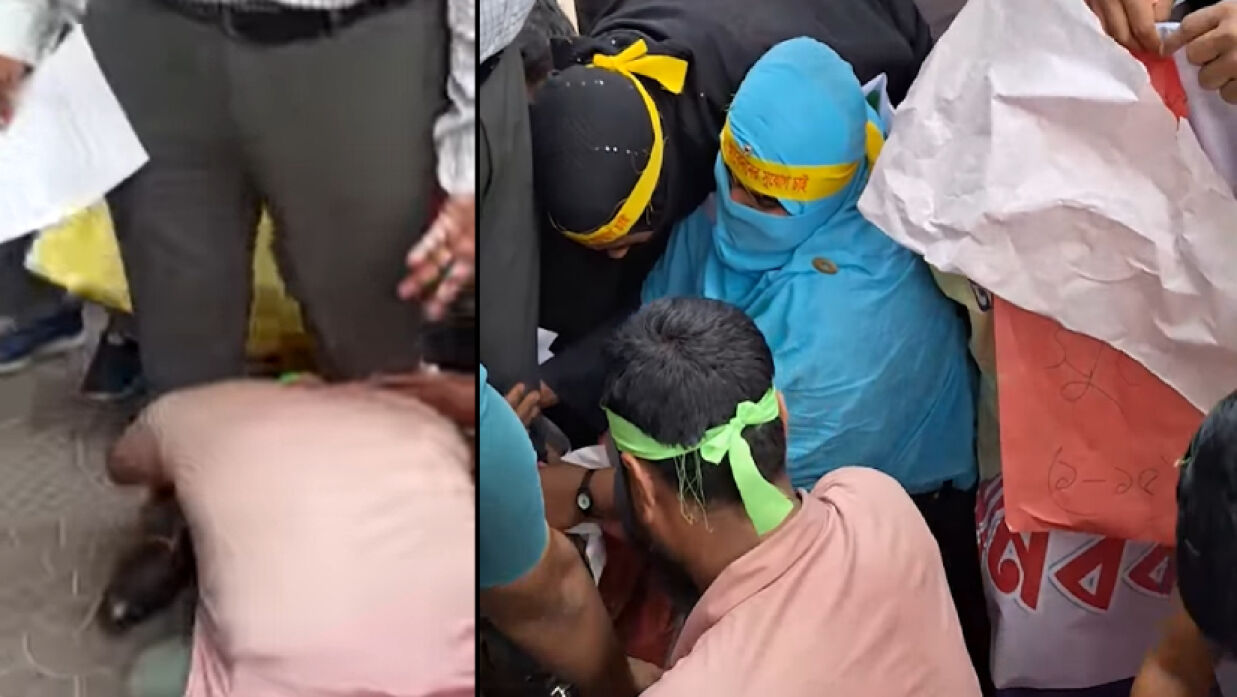 পা ধরে কান্না করছেন নিবন্ধনধারীরা