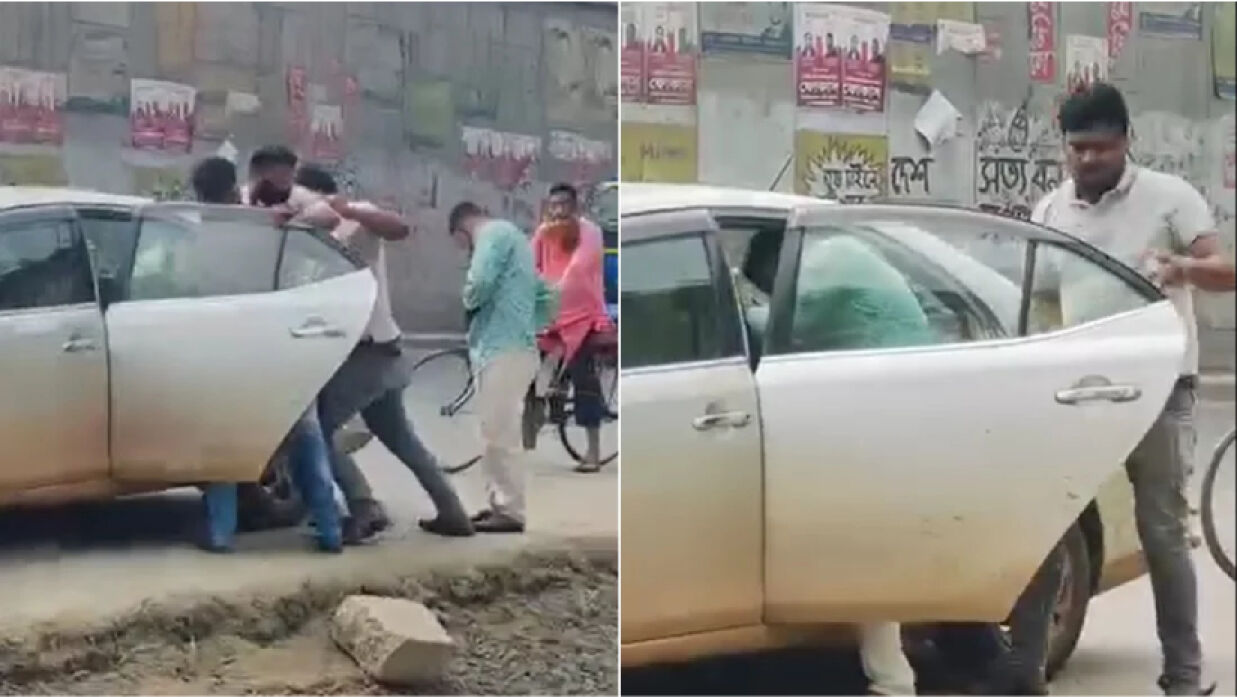 জোর করে যুবককে তুলে নিয়ে যাওয়া হচ্ছে